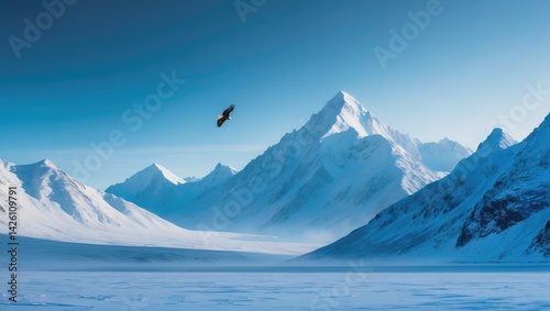 Majestic snow-covered mountains set against a clear blue polar sky