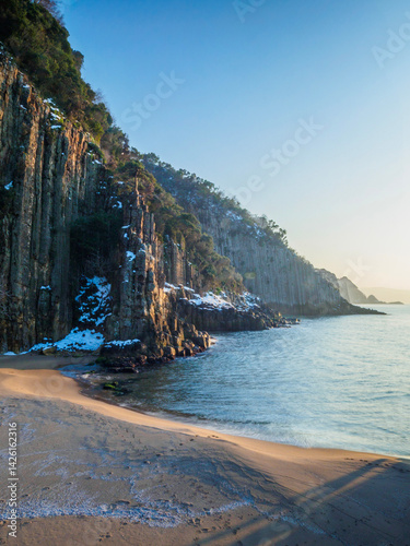 image of basalt columns in winter snow