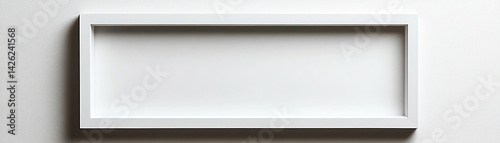 Wallpaper Mural Close-up of white rectangular picture frame on plain wall, showcasing minimalistic design and clean lines Torontodigital.ca