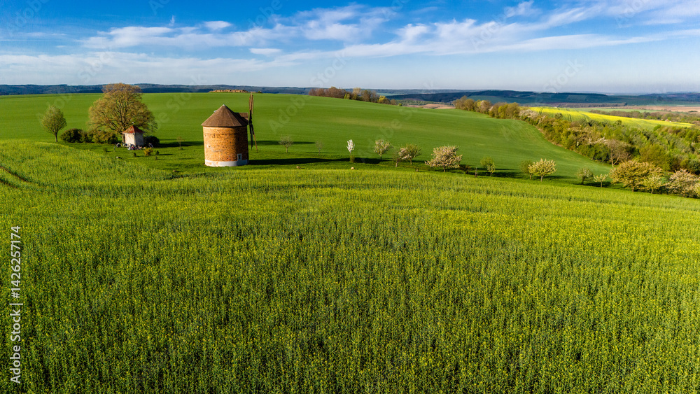 chvalkovice windmill in spring landscape captured by drone..