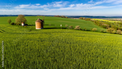 Obraz na płótnie chvalkovice windmill in spring landscape captured by drone.. w salonie