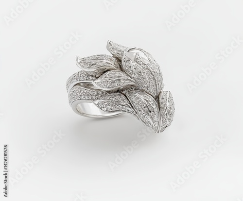 Exquisite diamond ring, featuring a sculpted floral design, meticulously crafted with pave diamonds photo