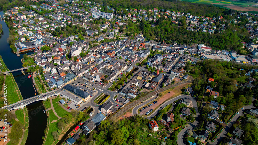 An aerial panorama view around the old town of the city Diez in Germany on a sunny spring day.