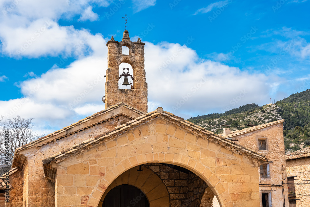 Old stone church with bell tower in the beautiful town of Beceite, Teruel,