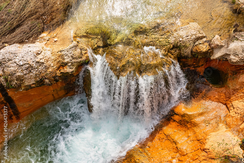 Obraz na płótnie Waterfall formed by the river as it passes through the town of Beceite in the province of Teruel, Aragon. w salonie