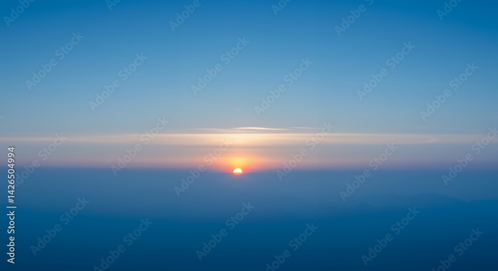 Fototapeta premium Sunset Over Mountains at Dusk