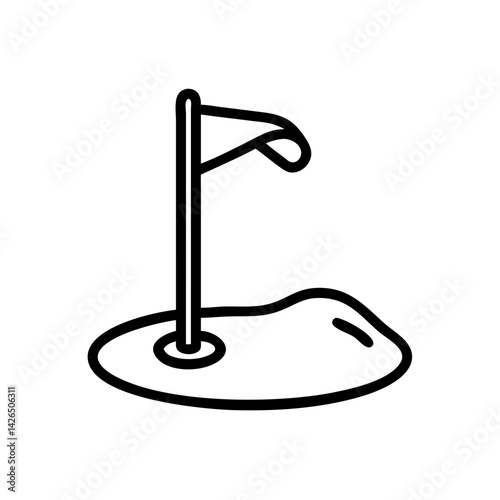 Golf flag marking a hole in the sand  
