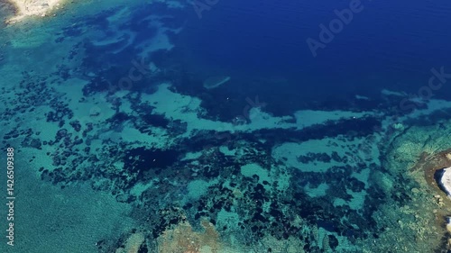 Breathtaking Aerial View of Foca Coastline Embracing Turquoise Aegean Sea in Izmir, Turkiye