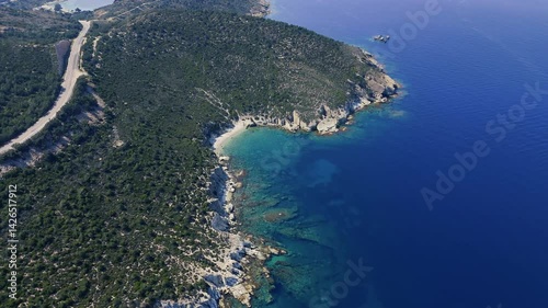 Breathtaking Aerial View of Foca Coastline Embracing Turquoise Aegean Sea in Izmir, Turkiye