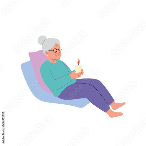Elderly woman relaxing with candle in a cozy setting  