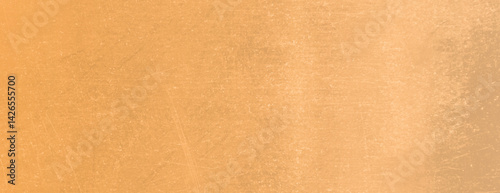 aTextured gold background with a brushed metal style. The gold background has a subtle sheen and fine scratches, enhancing its metallic appearance. Minimal grunge paper texture vector background