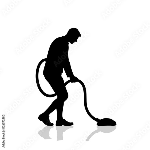Silhouette of a person vacuuming against a plain background  