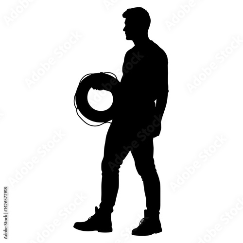 Silhouette of a man holding cable in a creative stance  