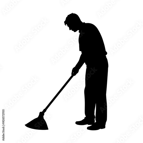 Silhouette of a person cleaning with a broom  