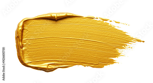 A close up of a smear of golden yellow paint on a black background showing texture and brush strokes