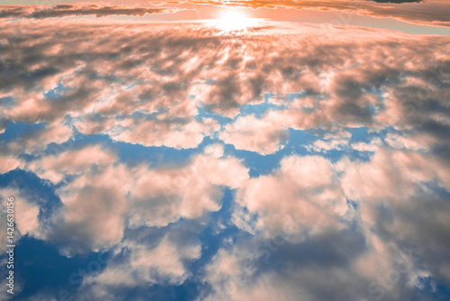 Dramatic sunset clouds seen from above — aerial view