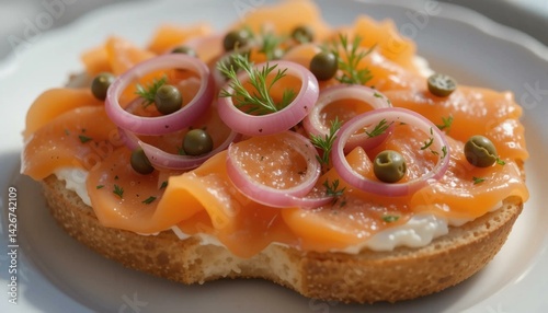 agel Topped with Smoked Salmon, Red Onion, and Capers
