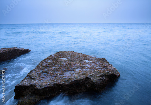 Ocean's Might: Cliffs Embraced by Waves