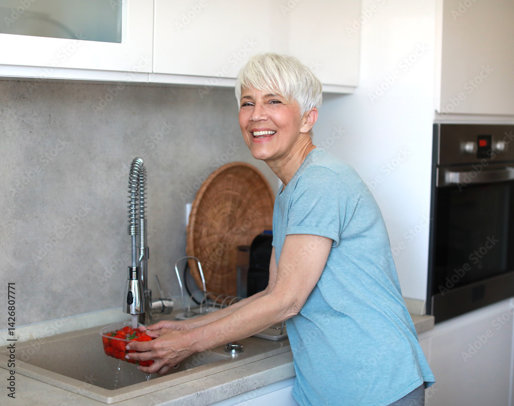 kitchen food woman healthy morning mature fruit water sink washing organic clean hygiene freshness preparation cleaning wash ingredient breakfast active diet home eating
