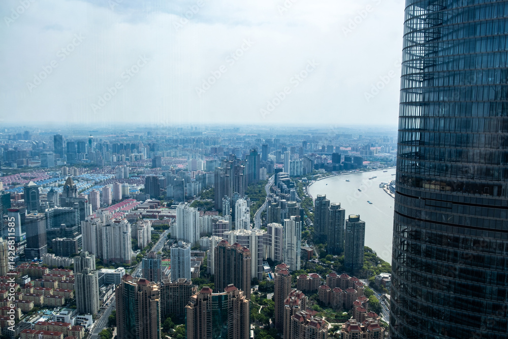 Shanghai city skyline view from above. High rise business skyscrapers in Lujiazui and Huangpu River. China