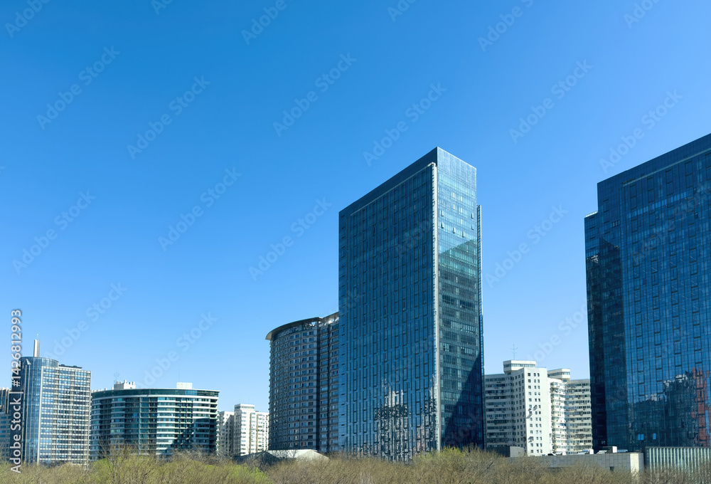 Beijing city high rise buildings against blue sky, China. Central Business District skyscrapers