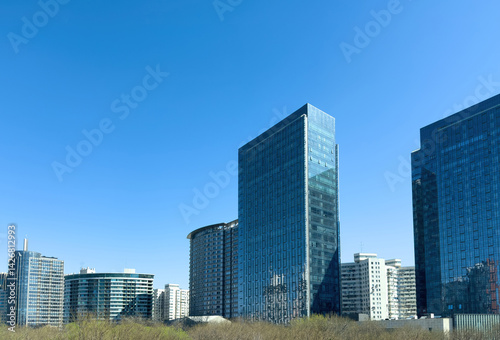 Obraz na płótnie Beijing city high rise buildings against blue sky, China. Central Business District skyscrapers w salonie