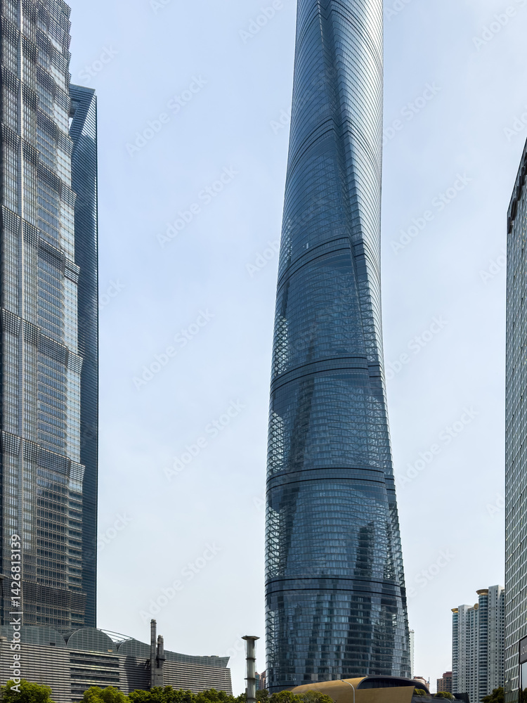 Shanghai city high rise buildings against blue sky, China. Business skyscrapers