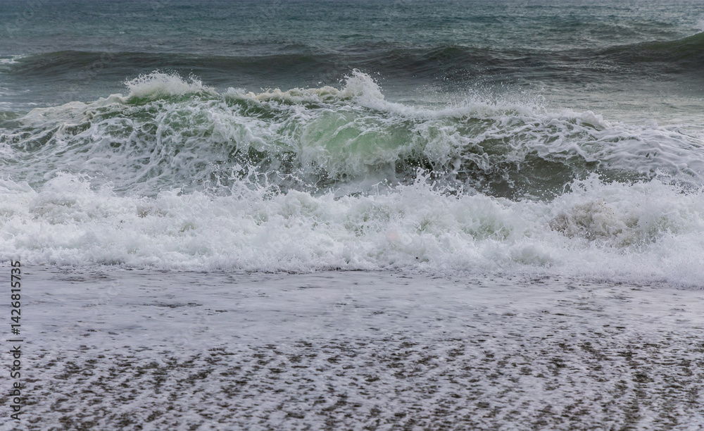 Fototapeta premium Big crashing waves in a stormy ocean. South Island, New Zealand