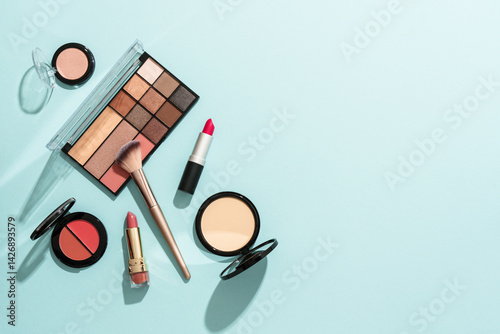 Obraz na płótnie Beauty products for professional make up on blue background. Flat lay. w salonie