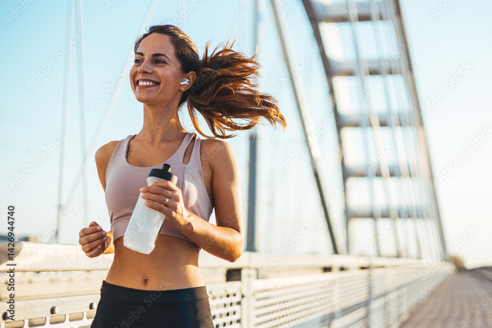 Smiling Woman Running on Bridge During Morning Exercise Routine