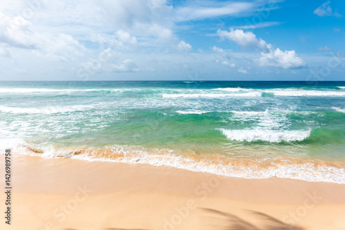 Scenic tropical beach view to horizon at Galle