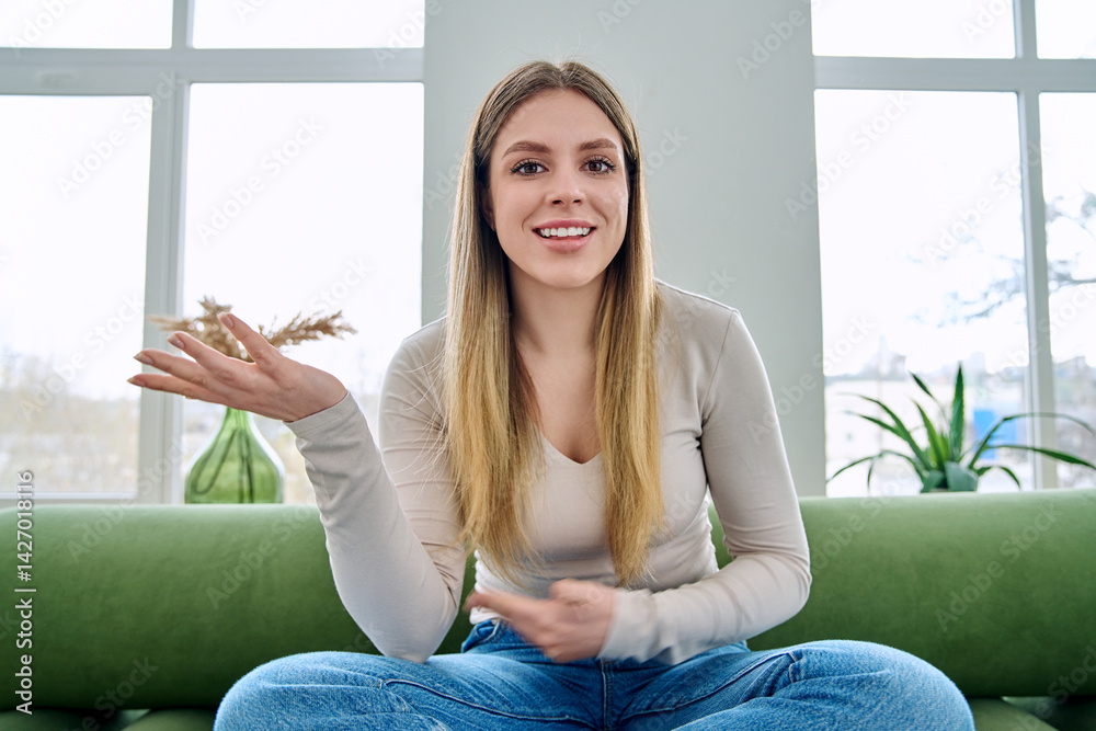 Web cam view of young woman talking looking in camera, online meeting, video call