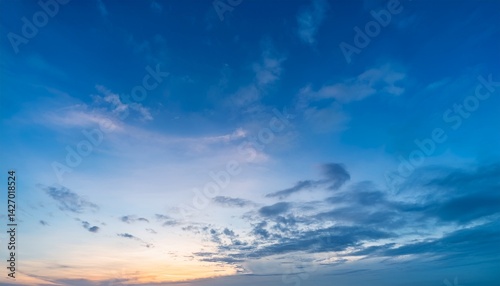 beautiful twilight blue sunset sky in soft and smooth white clouds with blue sky background