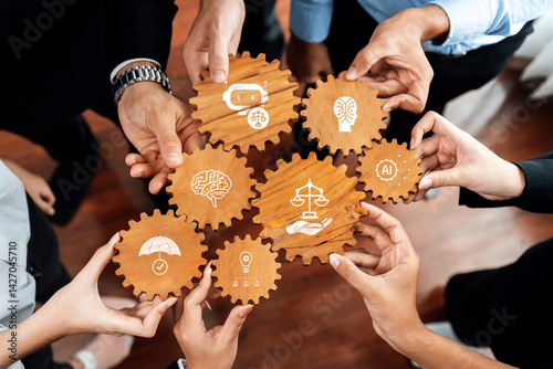 A dynamic image showcases diverse hands holding wooden gears, each featuring symbols of ethics, technology, and innovation, emphasizing collaboration in a business setting. Amity