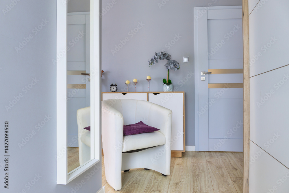 Armchair by the mirror in the dressing room