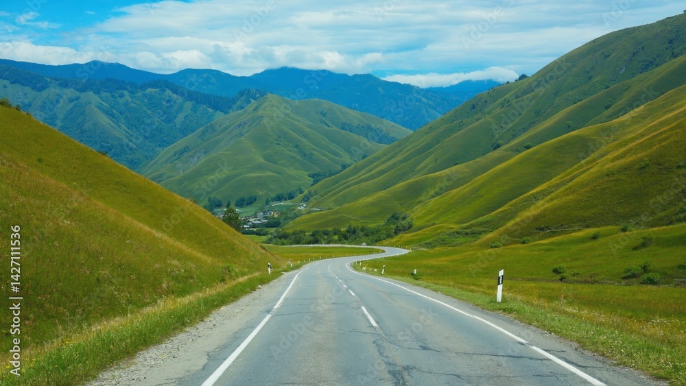Fototapeta premium Winding asphalt highway on mountainous terrain.