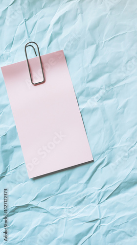 Blue note paper on blue background