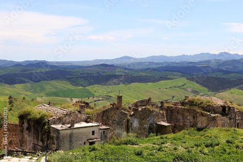 Abandoned Hilltop Village of Craco in Basilicata, Italy with Scenic Rolling Hills