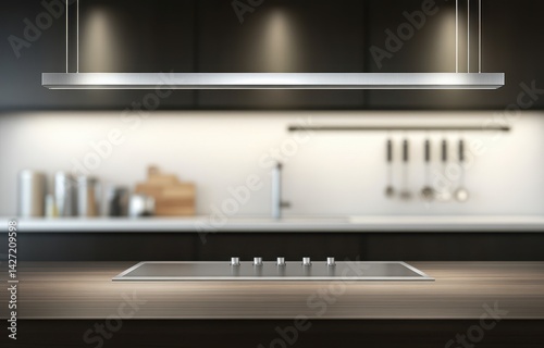 Modern kitchen countertop with stovetop and hanging light