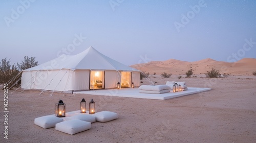 Luxurious desert tent at dawn.  Spacious, minimalist, and comfortable glamping in the dunes photo