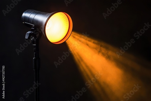 Studio spotlight illuminating a scene