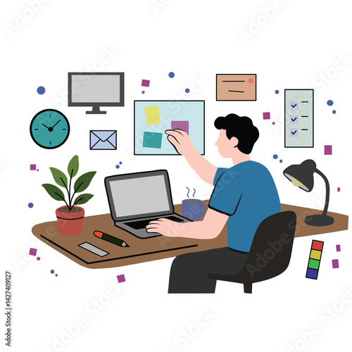 Young man working on laptop at organized desk in a creative home office