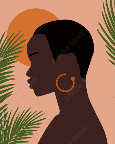 Boho portrait of a beautiful afro girl with tropical leaves and sun