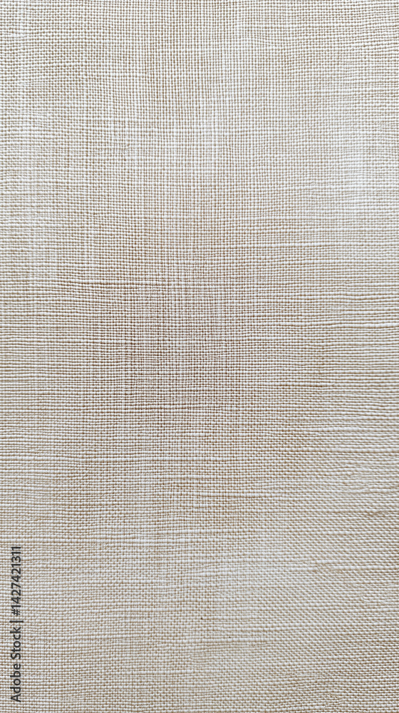 Fototapeta premium Neutral woven fabric close-up showing intricate texture and natural fibers under soft lighting in an indoor setting