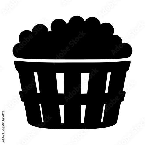Stylized silhouette of a laundry basket overflowing with clothes or fluff
