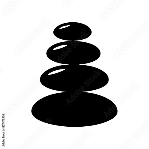 Black stacked stones in a zen design convey balance and calm