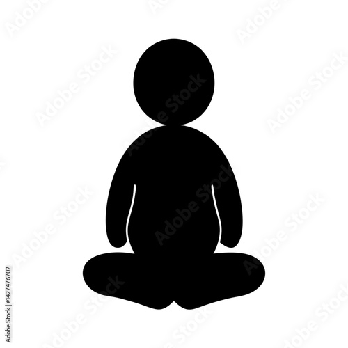 Silhouette of a person sitting in lotus position for mindfulness and meditation