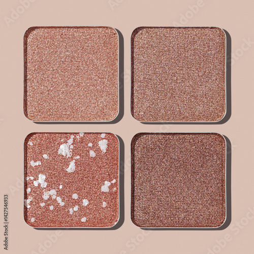 Obraz na płótnie Neutral Eyeshadow Palette with Matte and Shimmer texture, natural colored shades on beige. Set of eyeshadow refills, Top view of four Swatches Eyeshadow makeup for cosmetic, makeup, beauty concept w salonie