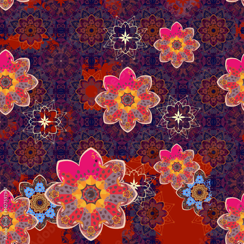 Mysterious multi-layered pattern with mandalas flowers over a complex crumbling ornament in ethnic style. Bright seamless print for fabric. Space motifs.