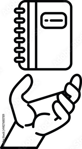 spiral notebook is being held by a hand